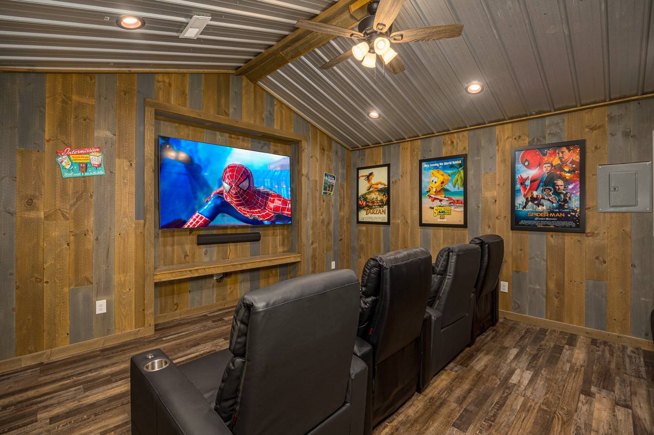 Lower level movie theater with cushy seating Lower level movie theater with cushy seating