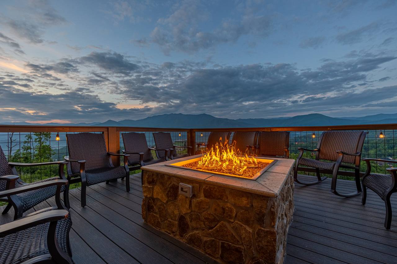 Sit by the gas firepit on the lower deck & take in the views! Sit by the gas firepit on the lower deck & take in the views!