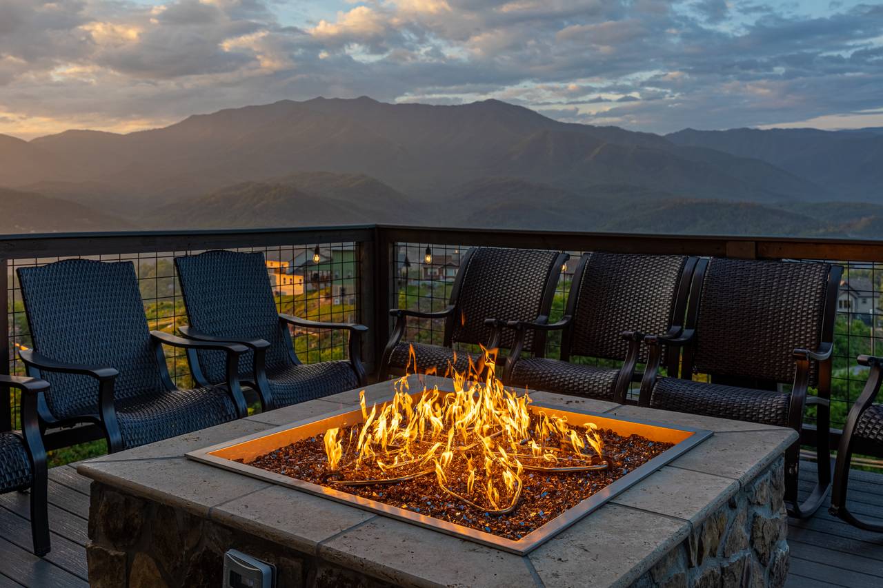 Sit by the gas firepit on the lower deck & take in the views! Sit by the gas firepit on the lower deck & take in the views!