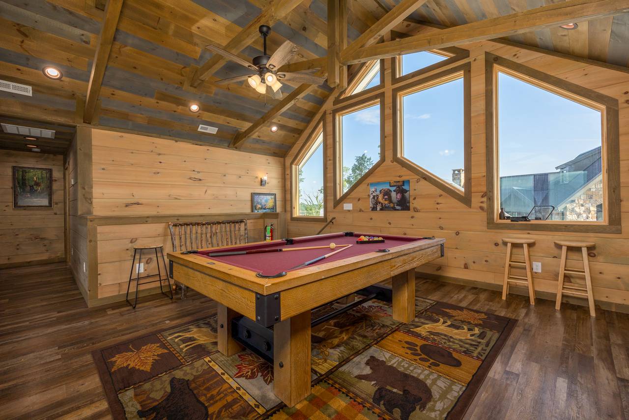 Upper level loft with pool table & TV Upper level loft with pool table & TV