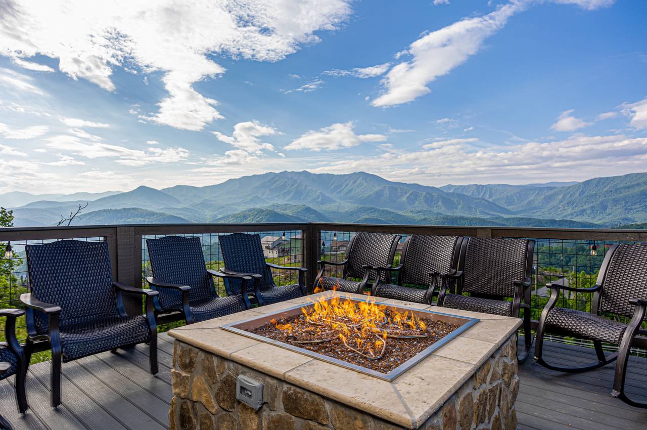 Sit by the gas firepit on the lower deck & take in the views! Sit by the gas firepit on the lower deck & take in the views!