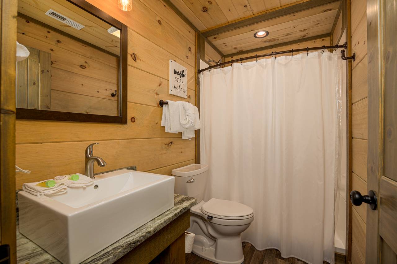 Bath 5: lower level full bath with standing shower Bath 5: lower level full bath with standing shower