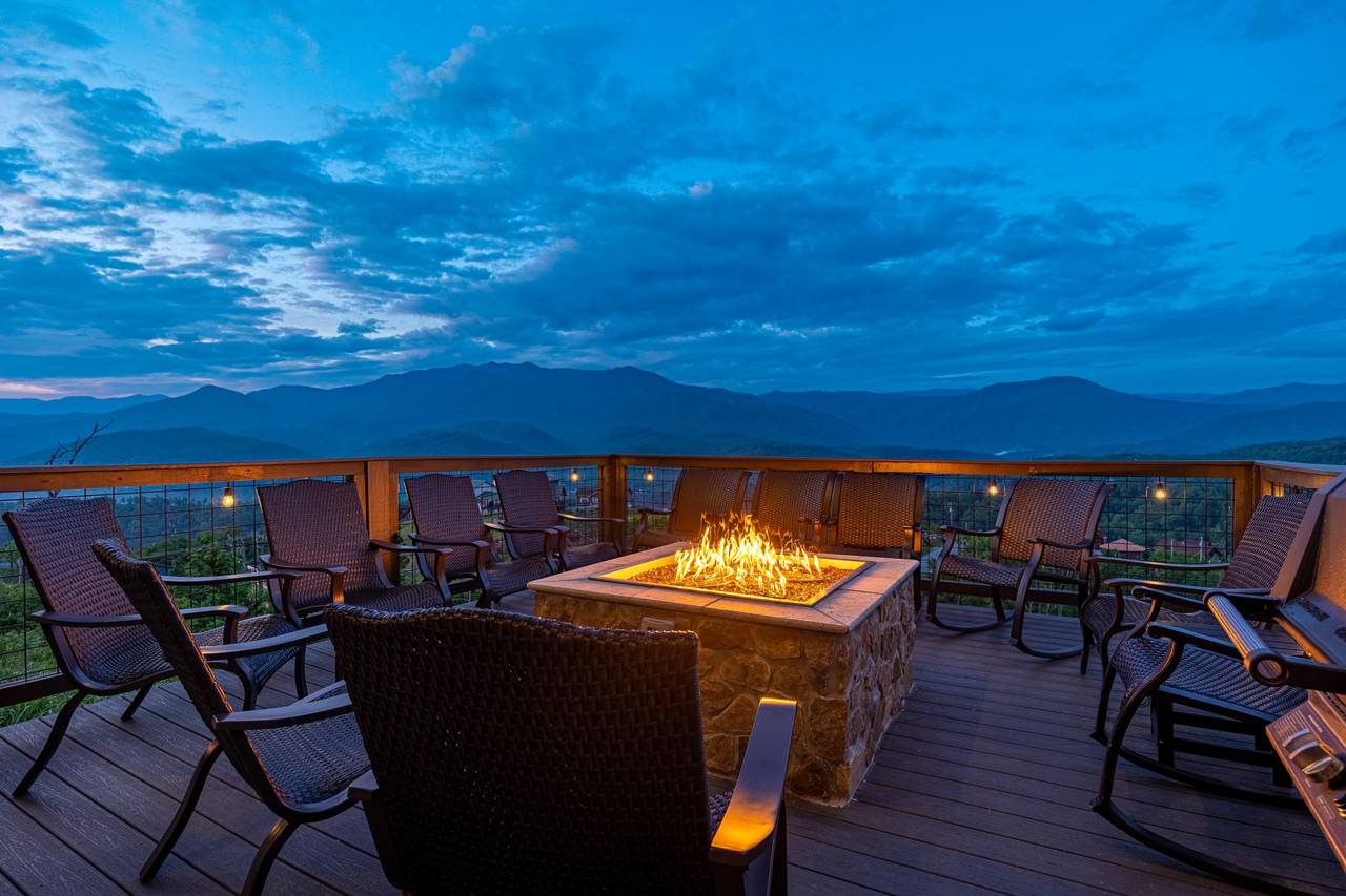 Sit by the gas firepit on the lower deck & take in the views! Sit by the gas firepit on the lower deck & take in the views!