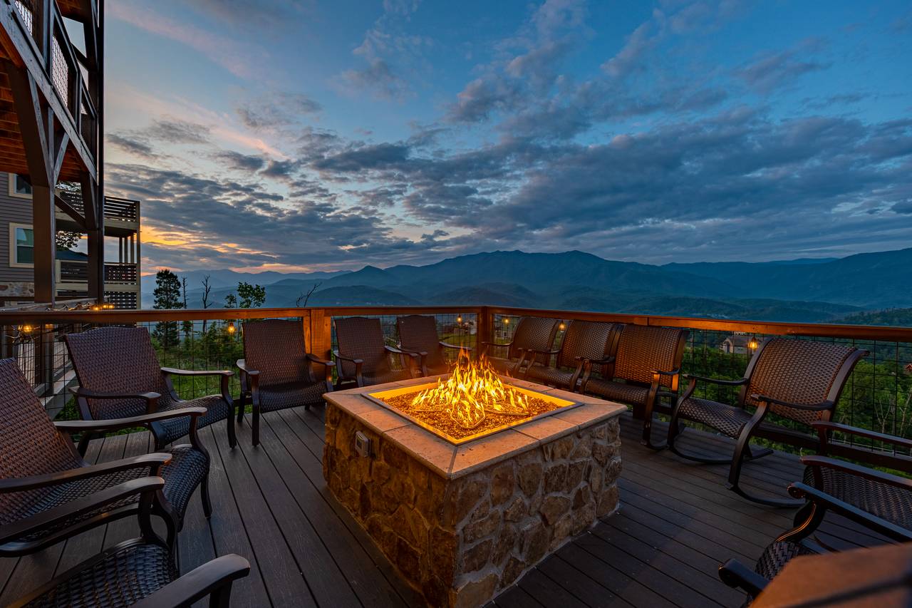 Sit by the gas firepit on the lower deck & take in the views! Sit by the gas firepit on the lower deck & take in the views!