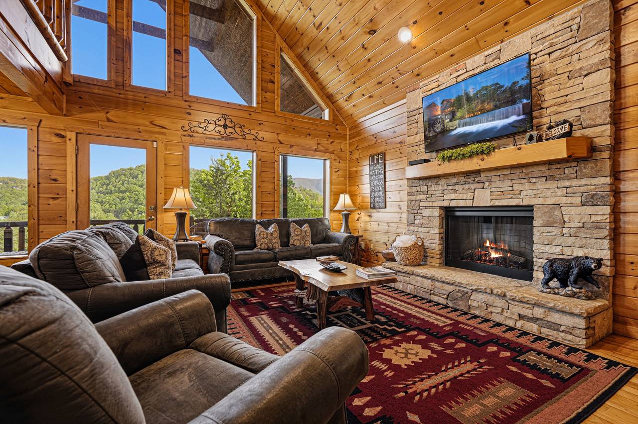 Open-concept living area with vaulted ceilings Open-concept living area with vaulted ceilings