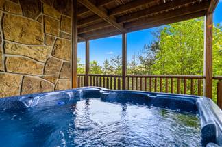 Lower level deck with private hot tub Lower level deck with private hot tub