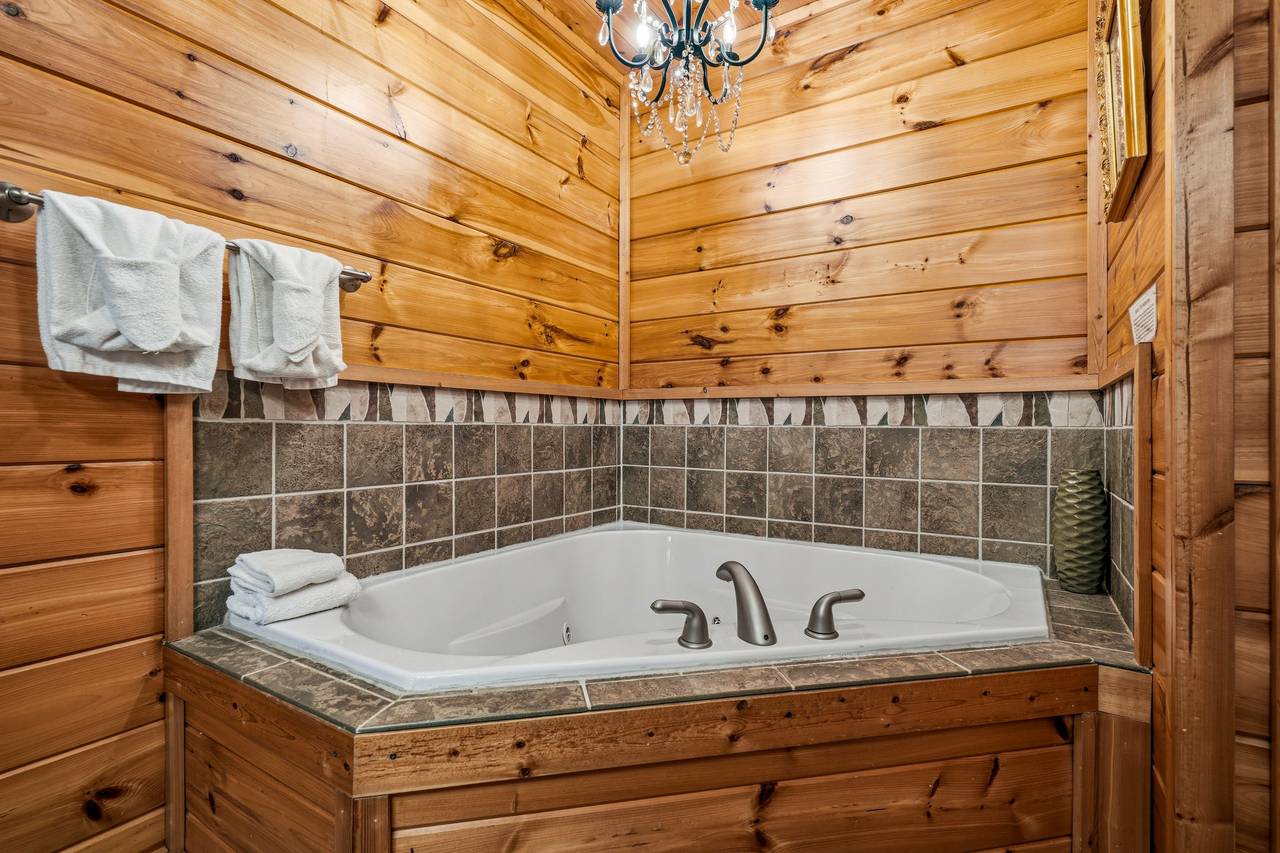 Lower level bath with jacuzzi tub & walk-in shower Lower level bath with jacuzzi tub & walk-in shower