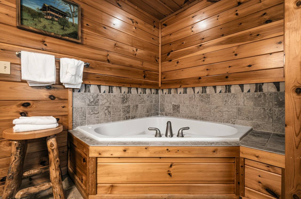 Ensuite bath with jacuzzi tub & walk-in shower Ensuite bath with jacuzzi tub & walk-in shower