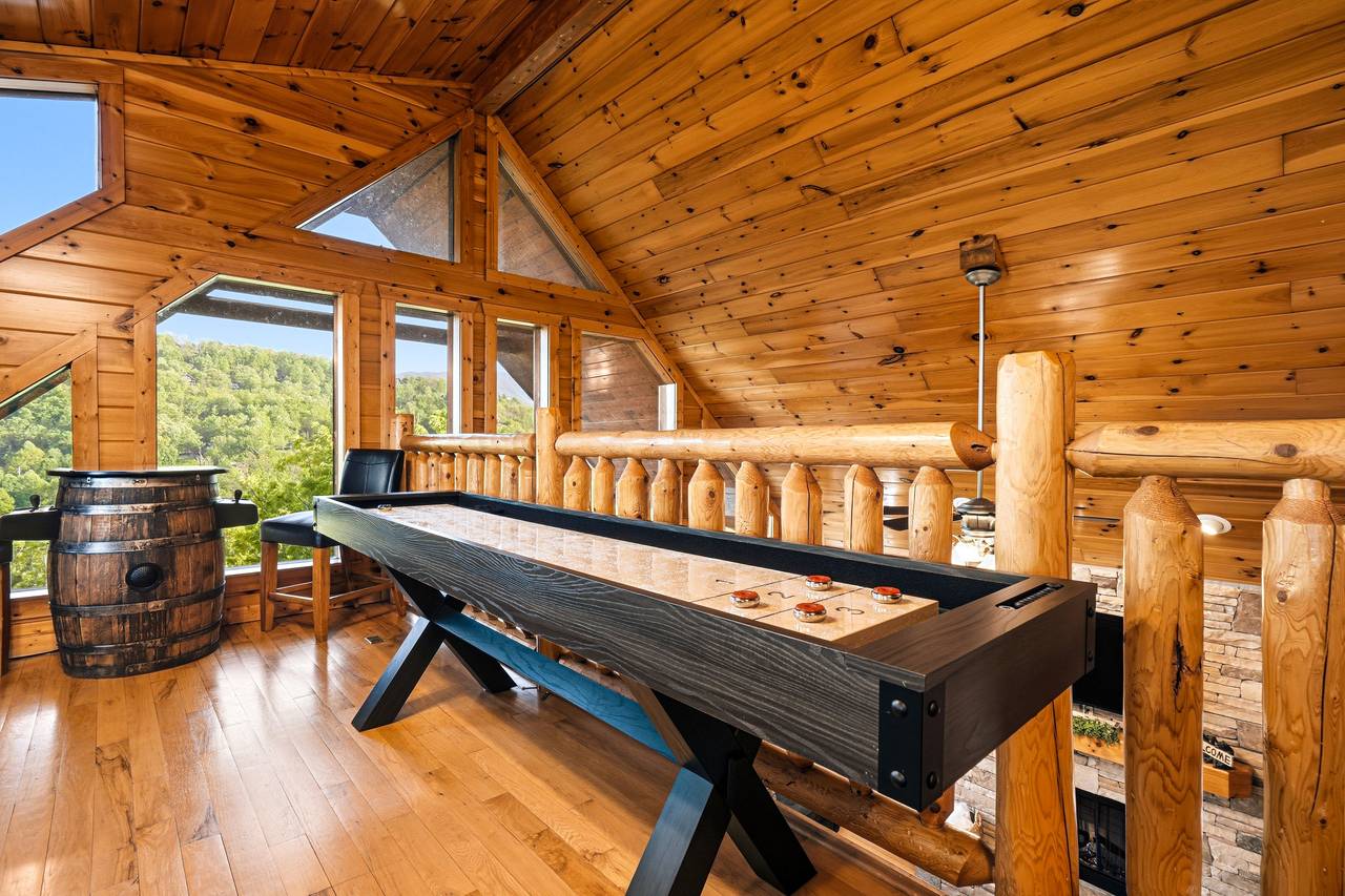 Upper loft game room with air hockey & arcade Upper loft game room with air hockey & arcade