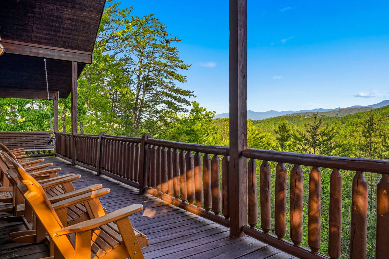 Main level deck with seating & Smoky Mountain views Main level deck with seating & Smoky Mountain views