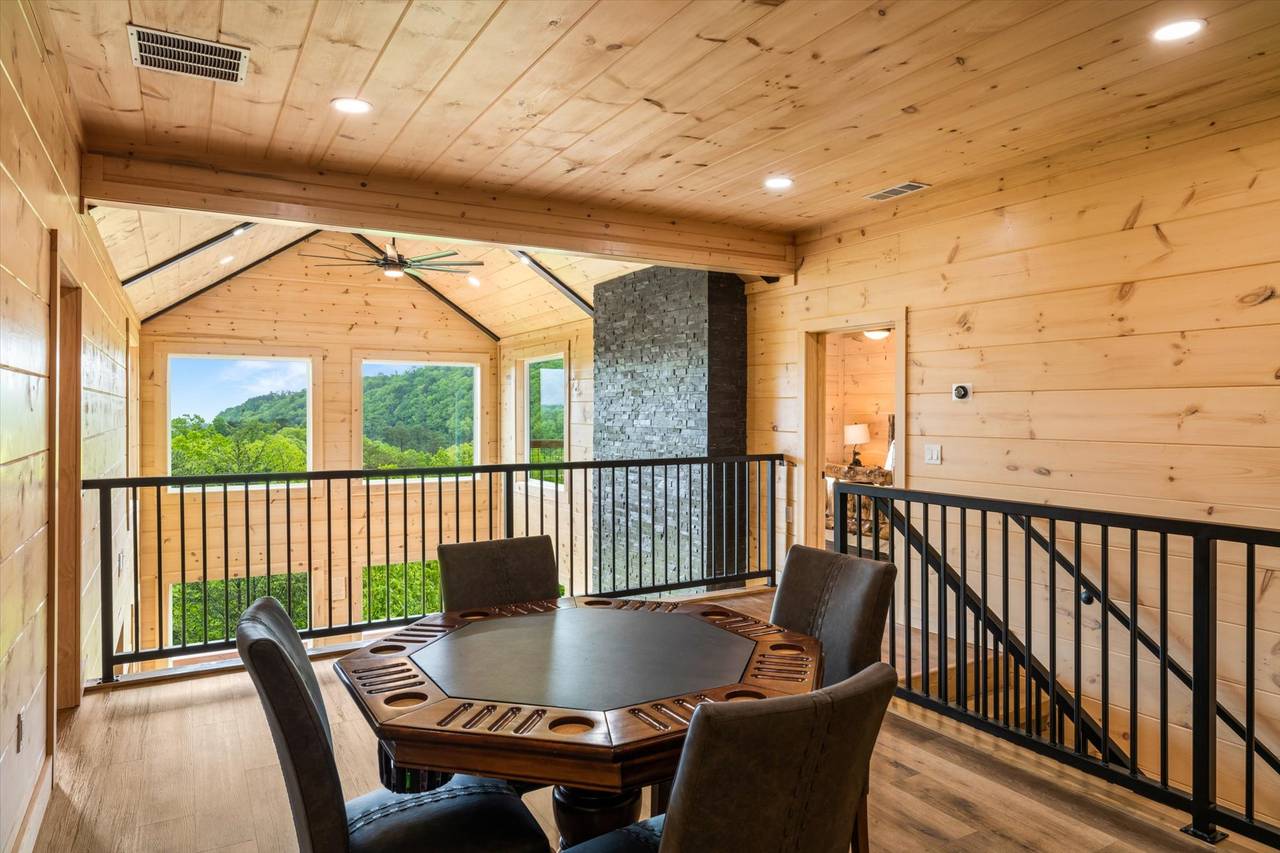 Upper level loft area with poker table Upper level loft area with poker table