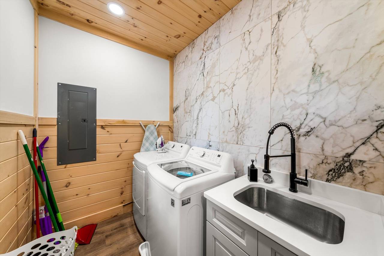 Full sized washing machine and dryer on entry level Full sized washing machine and dryer on entry level