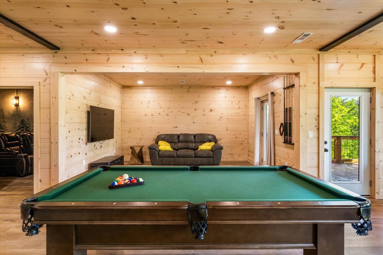Game Room w/ping pong, foosball, pool table, & sleeper sofa Game Room w/ping pong, foosball, pool table, & sleeper sofa