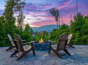 Outdoor space with a view, firepit, picnic table, & lounge chair Outdoor space with a view, firepit, picnic table, & lounge chair