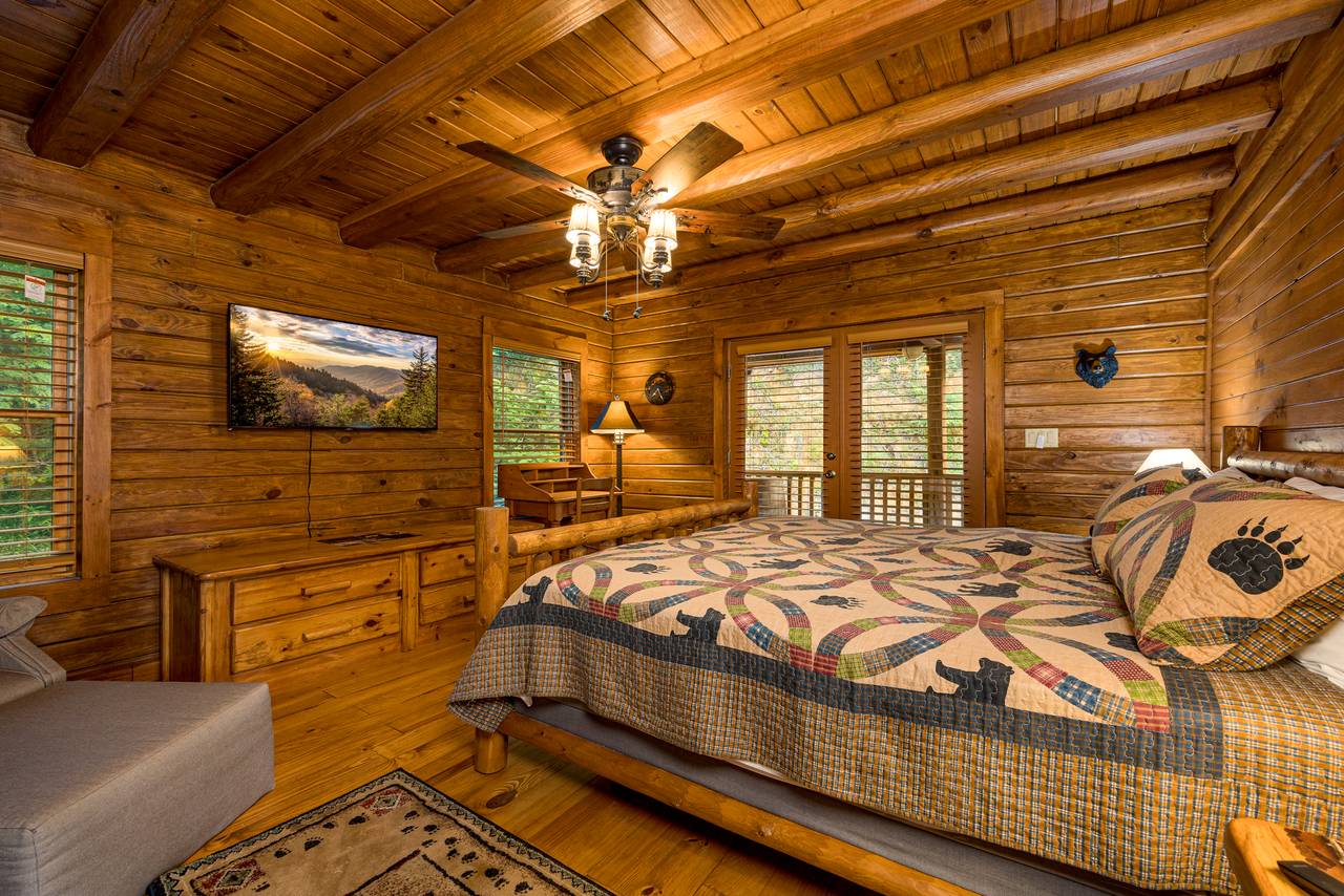Bed 1: Main level king with TV & ensuite full bathroom Bed 1: Main level king with TV & ensuite full bathroom