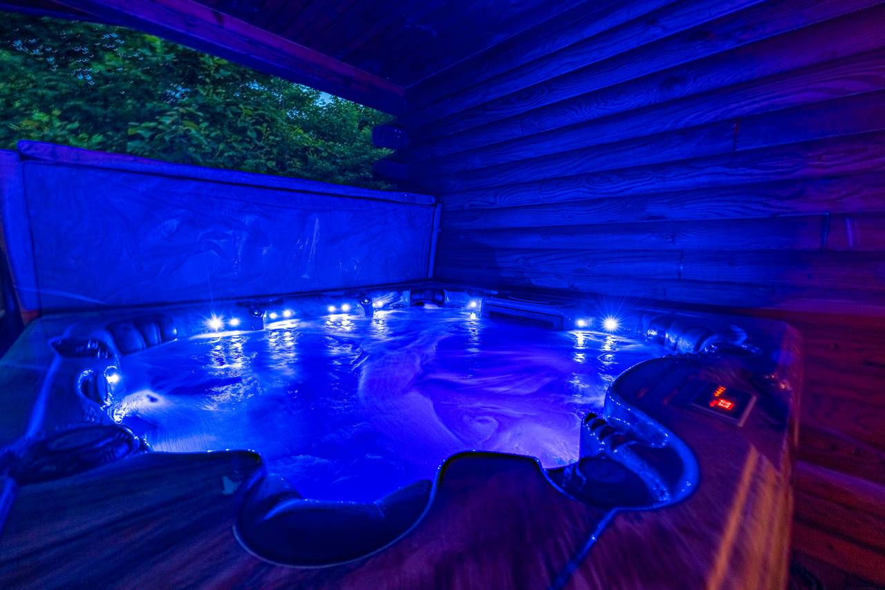 Soak your troubles away in a private hot tub. Soak your troubles away in a private hot tub.