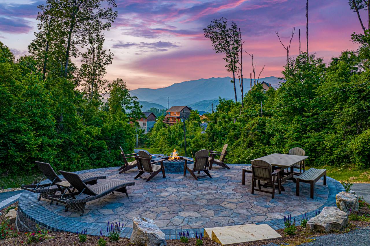 Outdoor space with a view, firepit, picnic table, & lounge chair Outdoor space with a view, firepit, picnic table, & lounge chair