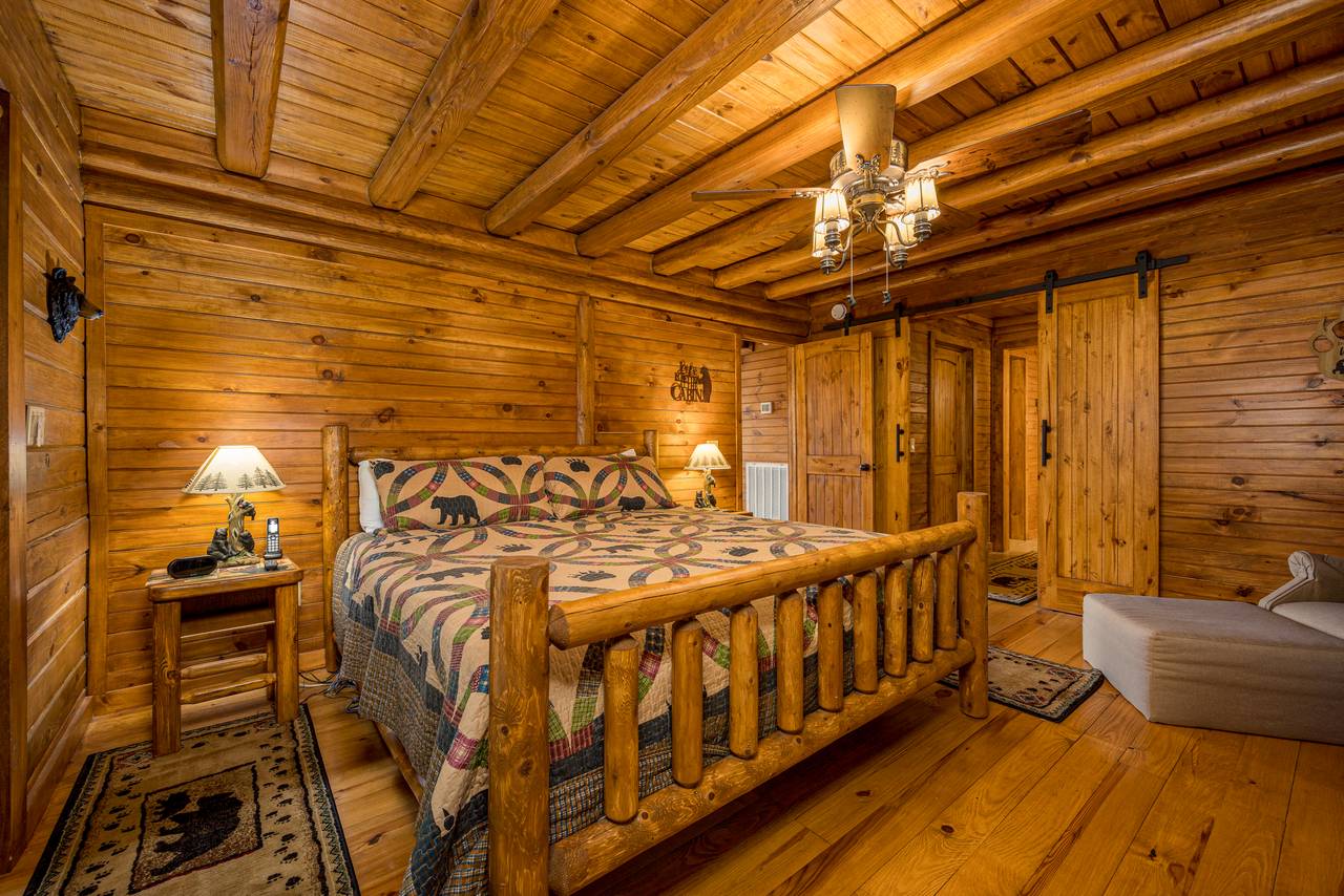 Bed 1: Main level king with TV & ensuite full bathroom Bed 1: Main level king with TV & ensuite full bathroom