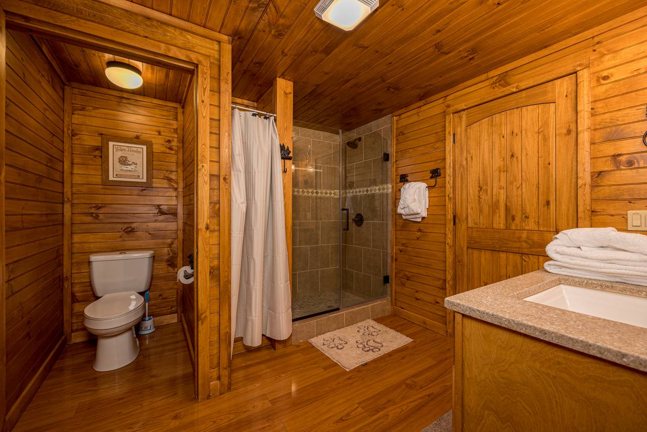 Bath 4: ensuite bath with standing shower; lower level Bath 4: ensuite bath with standing shower; lower level