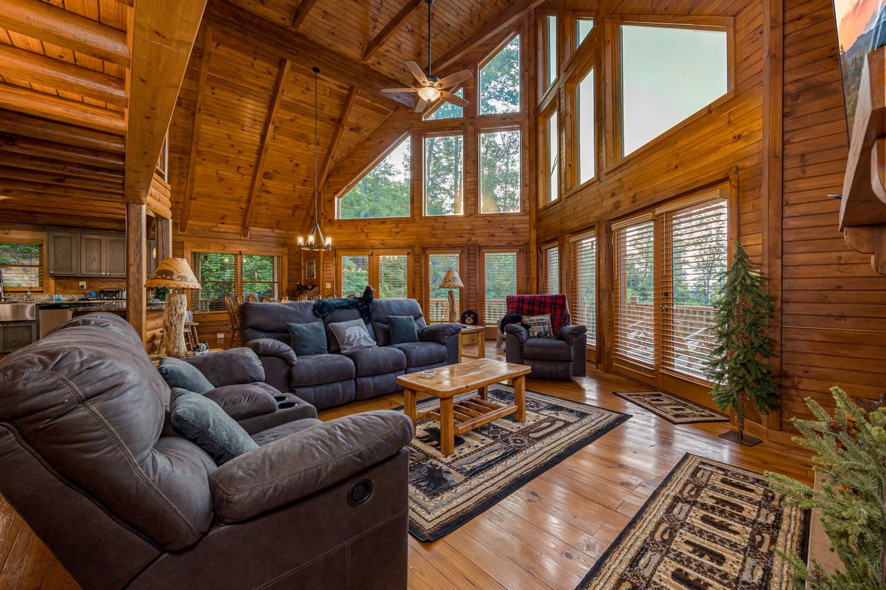 Living room with fireplace, comfy seating, and TV. Living room with fireplace, comfy seating, and TV.