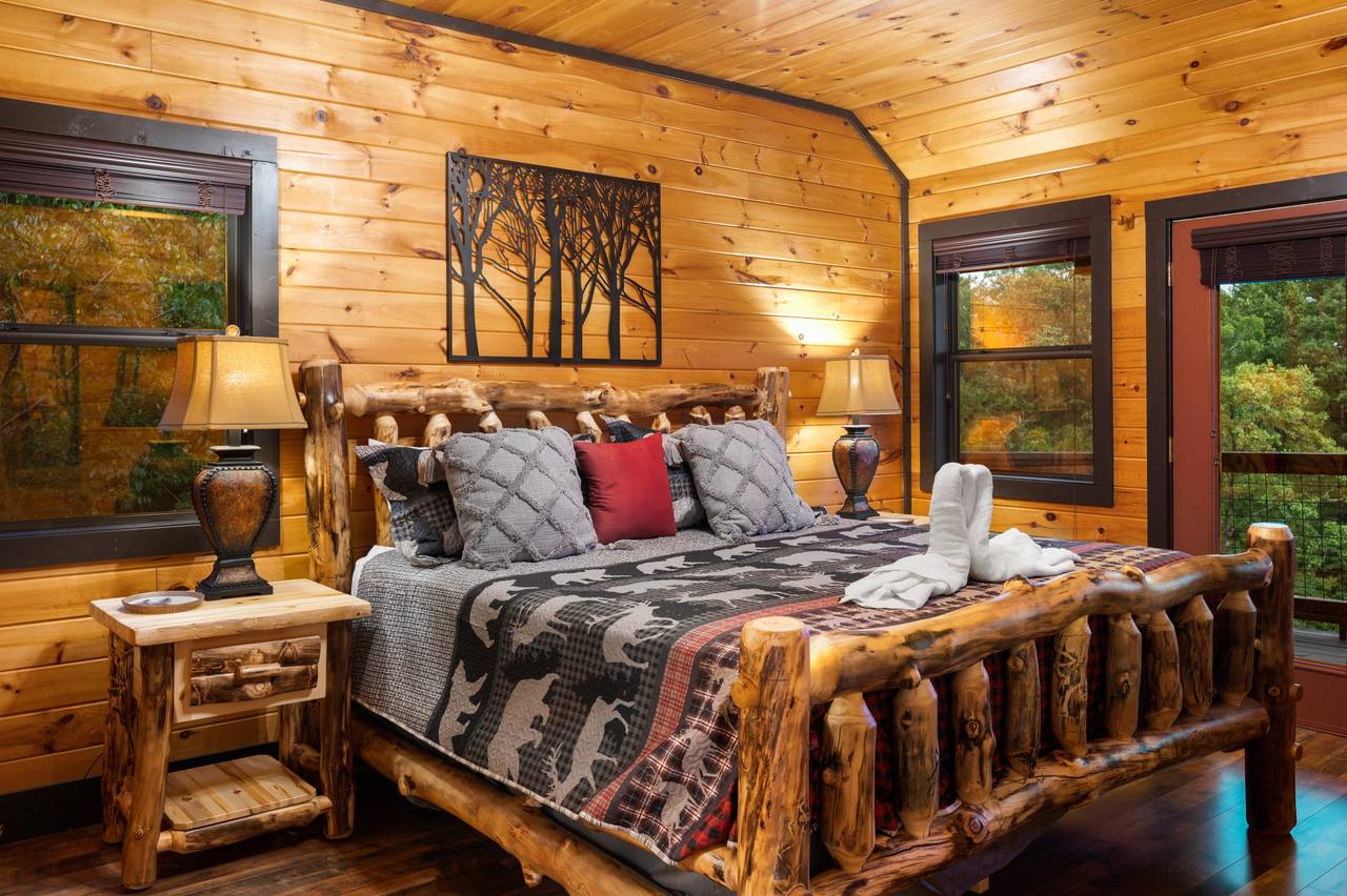 Bed 1: entry level king w/TV, deck access, & ensuite bath Bed 1: entry level king w/TV, deck access, & ensuite bath