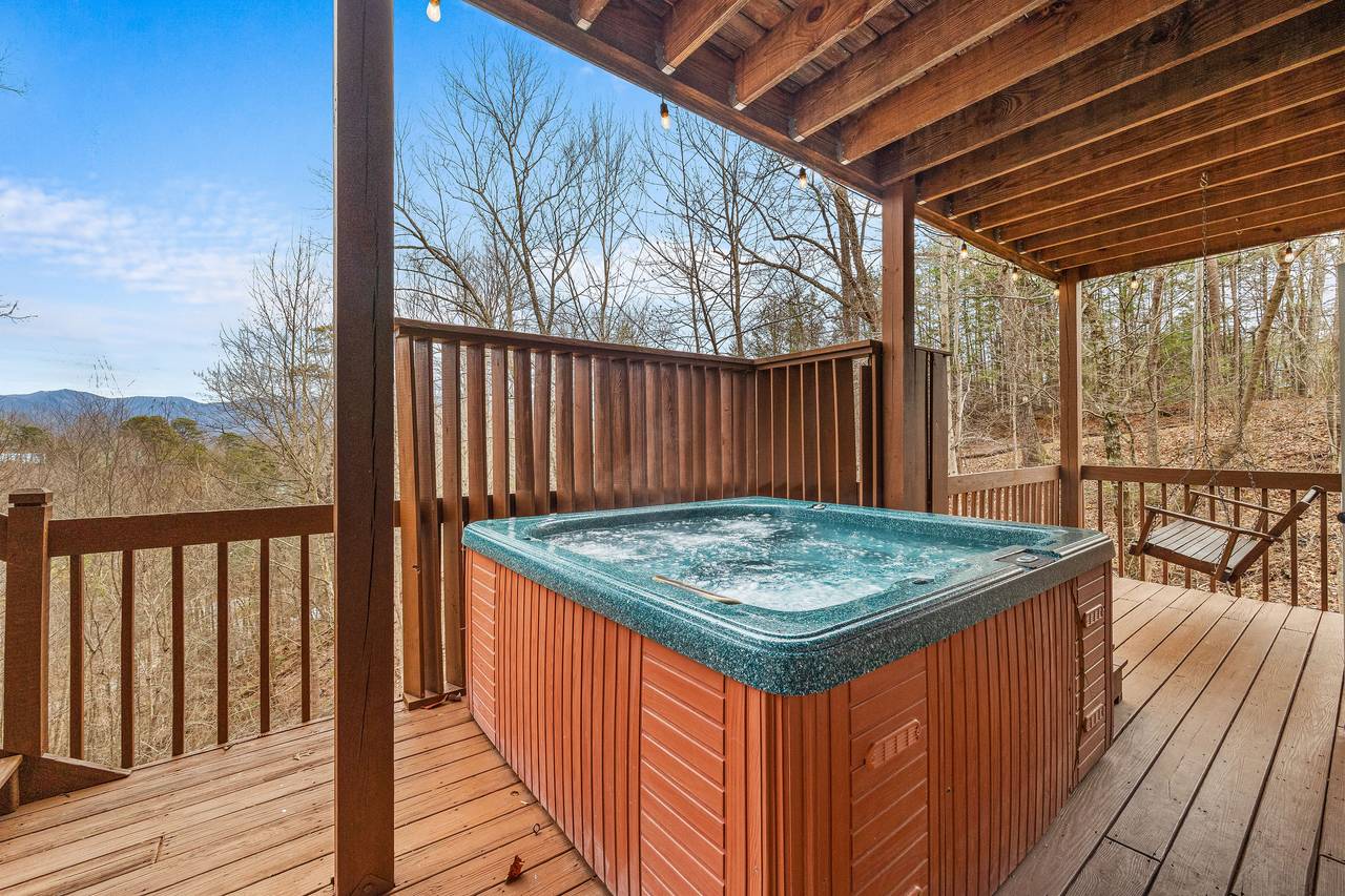 <span class="name">Private outdoor hot tub on the lower level deck</span> <span class="name">Private outdoor hot tub on the lower level deck</span>