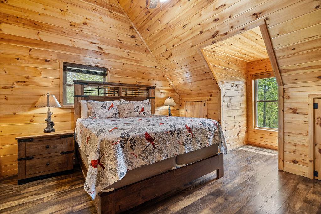 Upper level king with TV and ensuite full bathroom Upper level king with TV and ensuite full bathroom