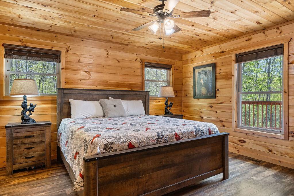 King bedroom with TV and ensuite full bathroom King bedroom with TV and ensuite full bathroom