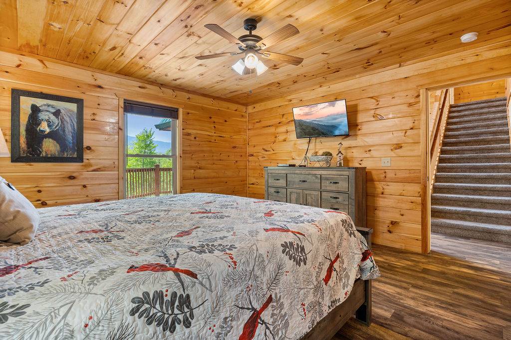 King bedroom with TV and ensuite full bathroom King bedroom with TV and ensuite full bathroom