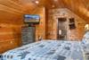Upper level loft w/king bed, private deck, TV, & ensuite bath Upper level loft w/king bed, private deck, TV, & ensuite bath