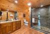 Upper level king ensuite full bath with standing shower Upper level king ensuite full bath with standing shower