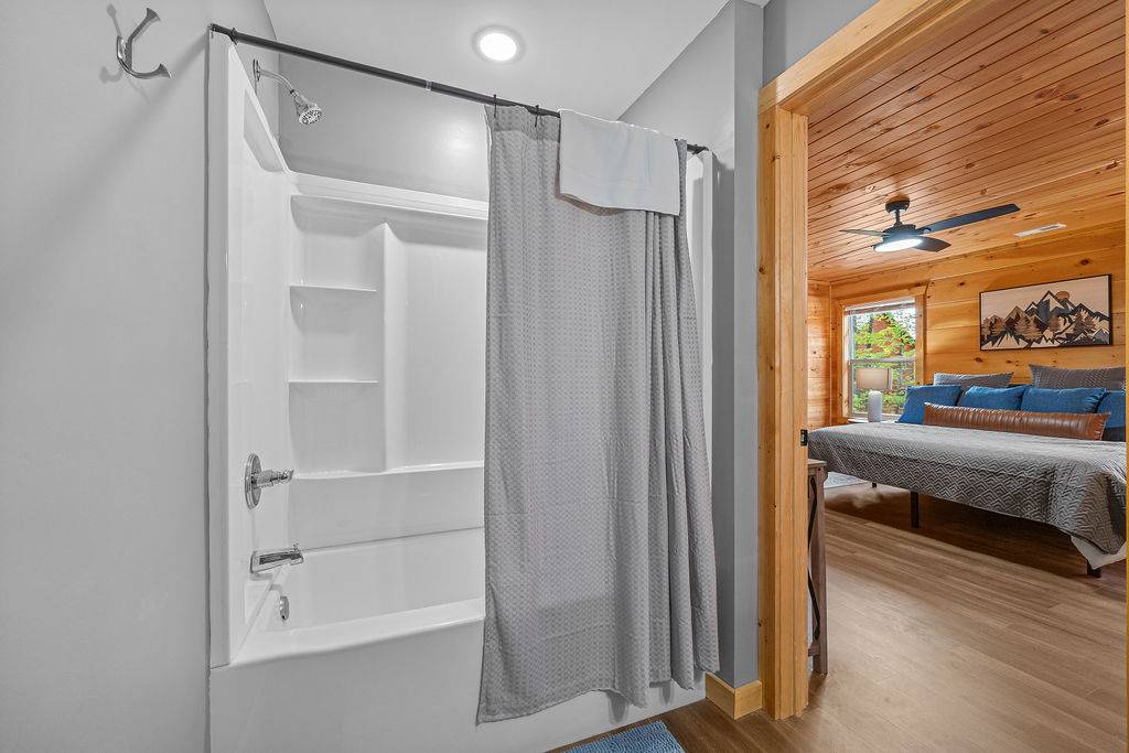King ensuite full bathroom with tub/shower combo