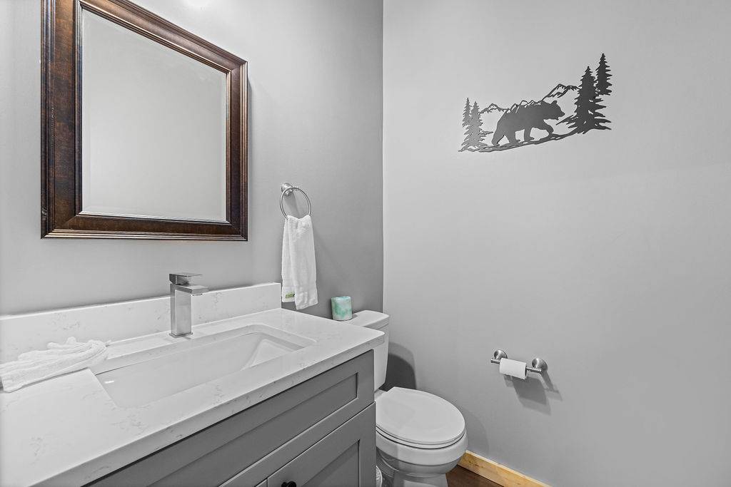 Lower level half bath in the game room