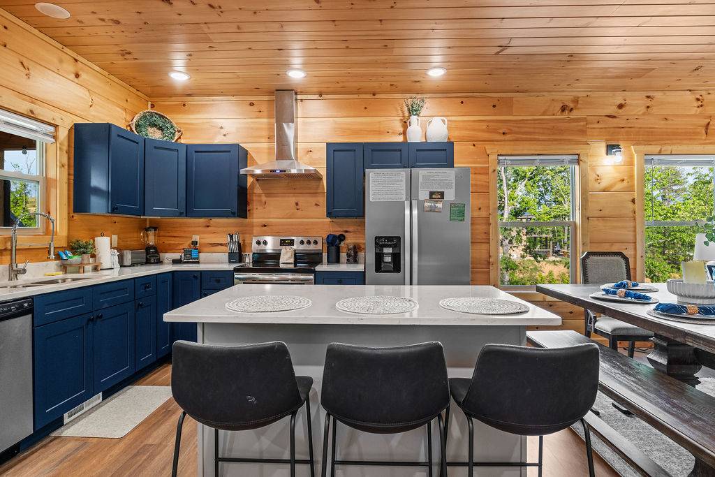 Fully equipped kitchen with island and additional seating