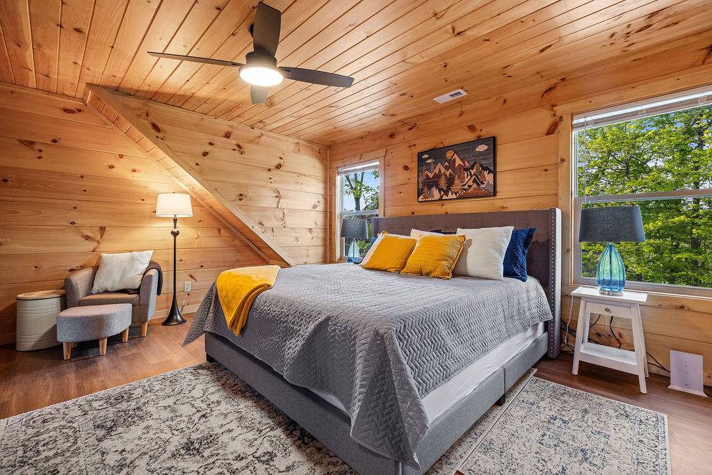 Upper level king bedroom with ensuite shared bath