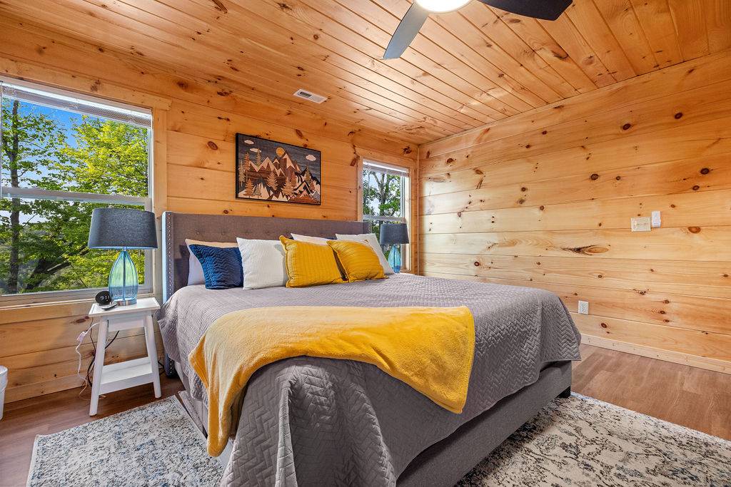 Upper level king bedroom with ensuite shared bath
