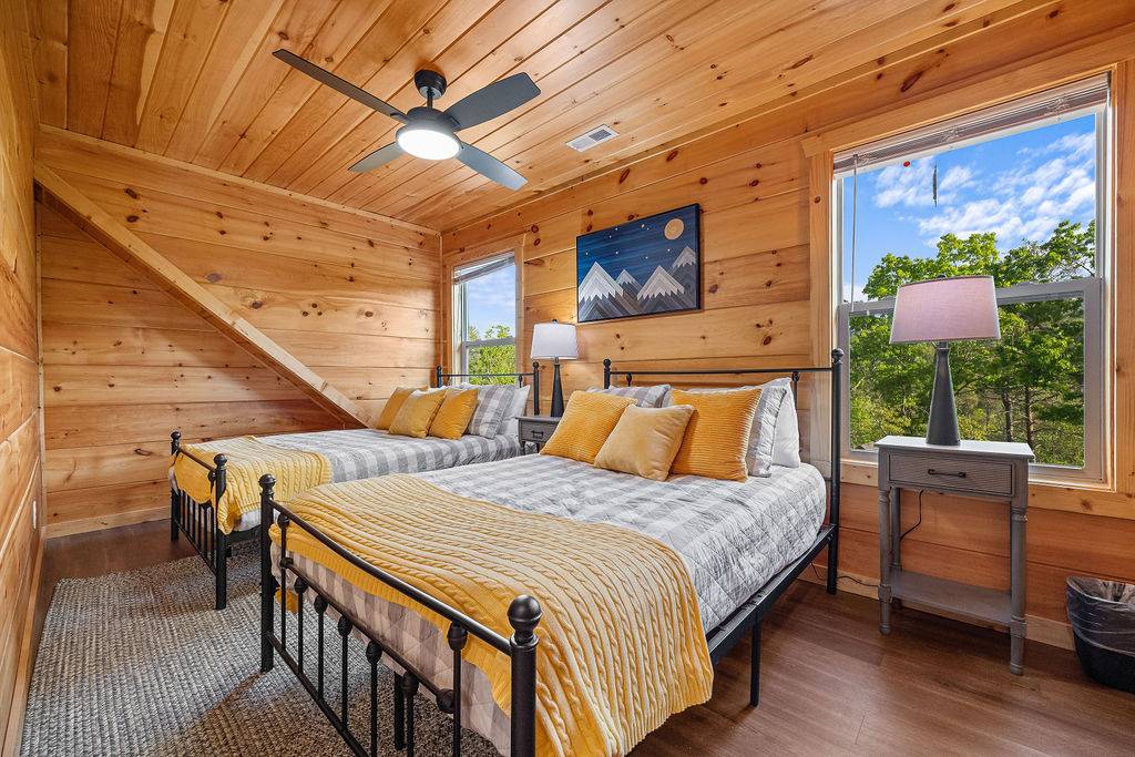 Upper level bedroom with 2 full beds