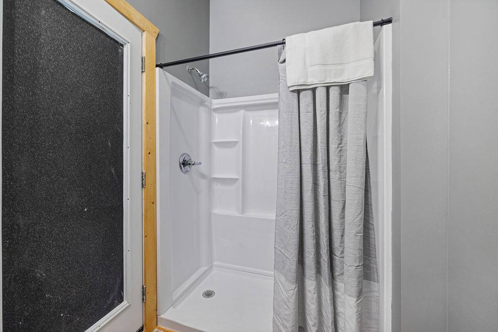 Lower level pool bathroom with shower