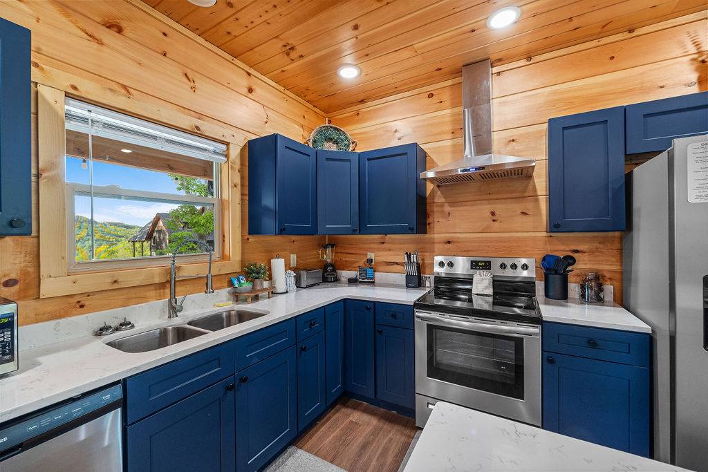 Fully equipped kitchen with island and additional seating