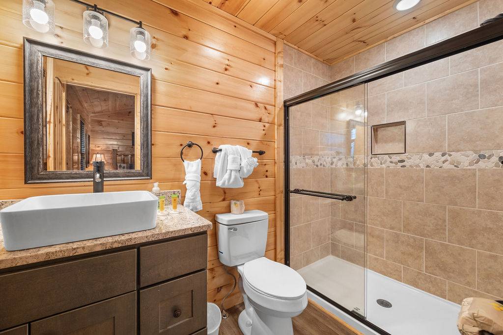 Upper level king ensuite full bathr with standing shower