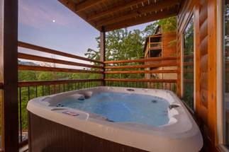 Private hot tub overlooking the mountain landscape Private hot tub overlooking the mountain landscape