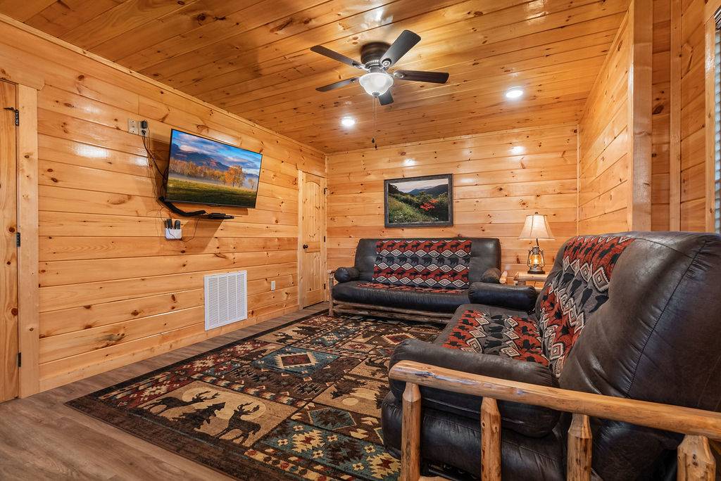 Lower level king bedroom w/2 futons, TV, & ensuite bath