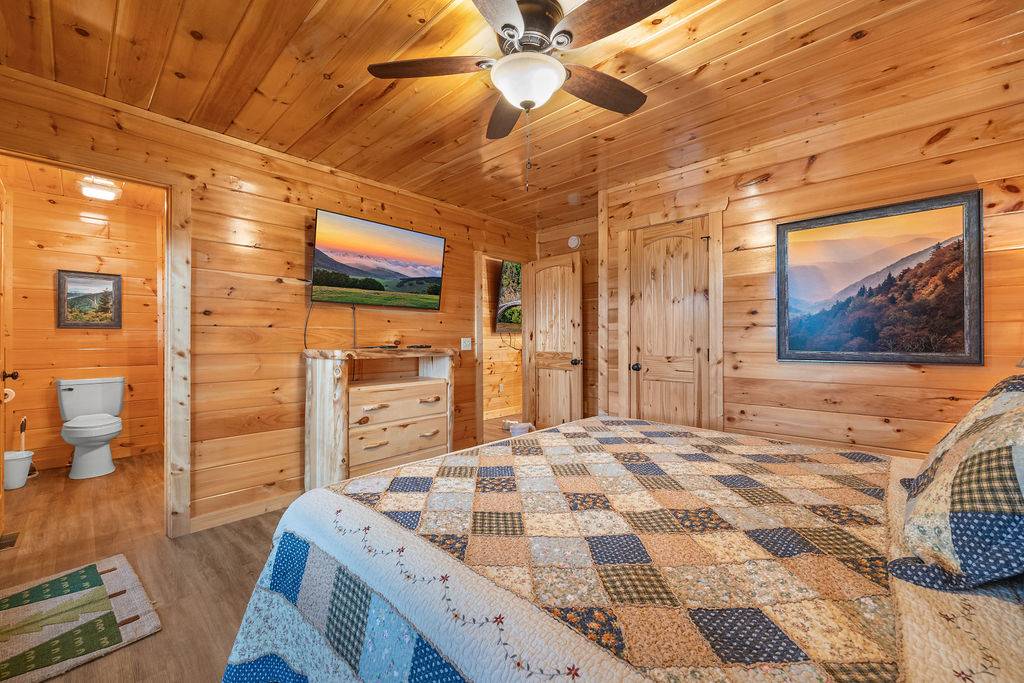 Entry level king bedroom with TV and ensuite full bathroom