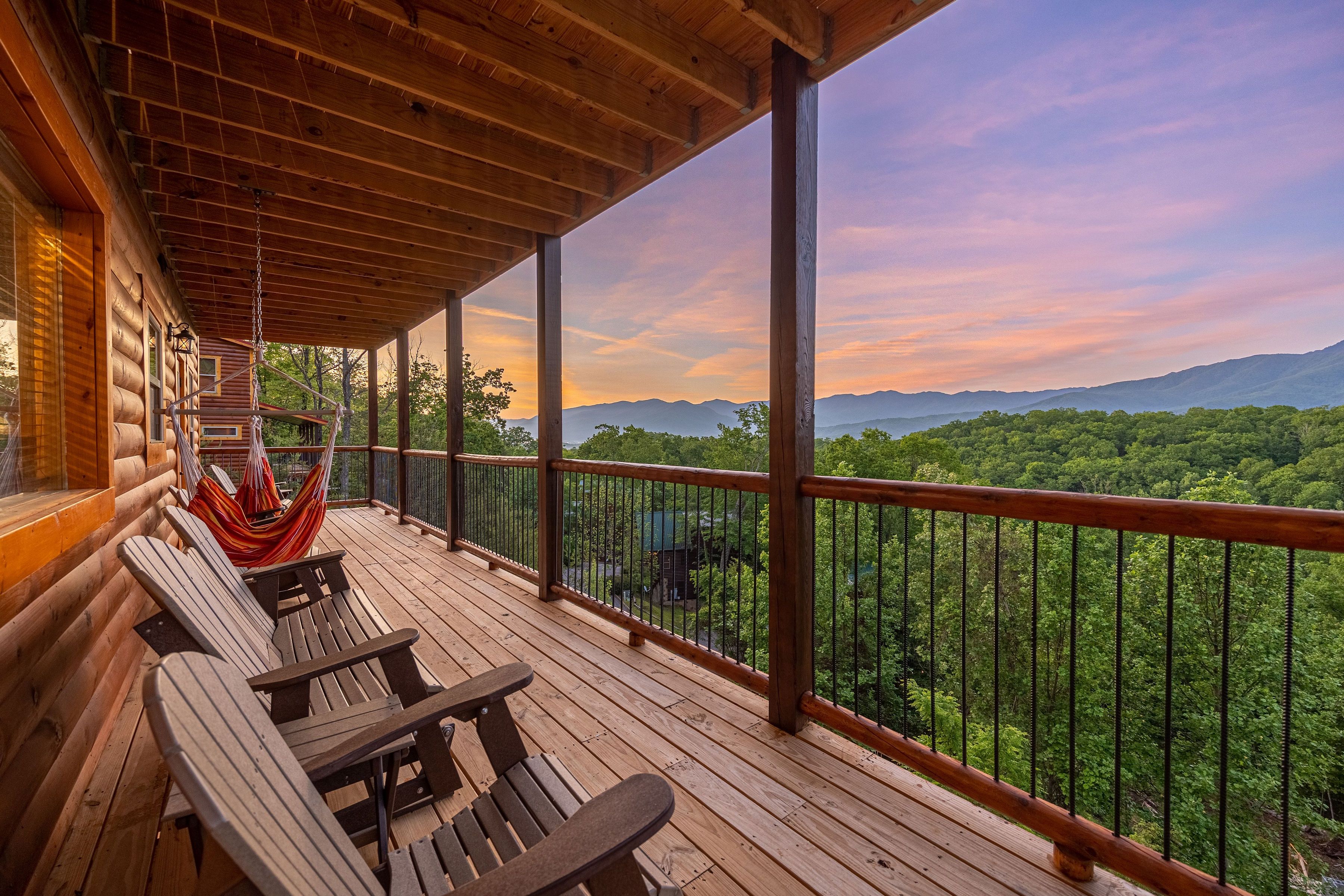 Rocking chairs and chair hammocks overlook the mountain views