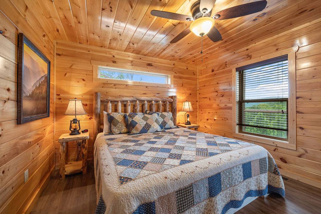 Entry level king bedroom with TV and ensuite full bathroom