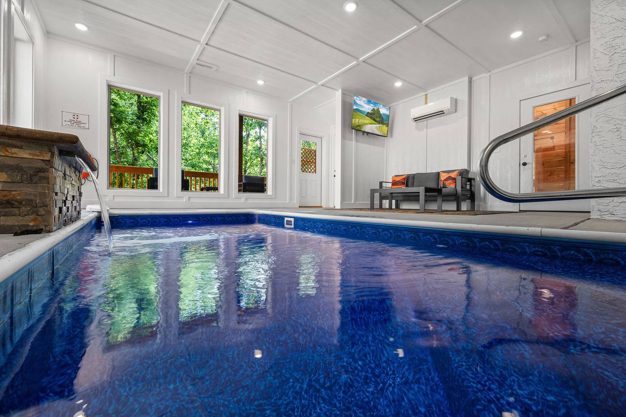 Private indoor heated pool - with seating area & TV Private indoor heated pool - with seating area & TV