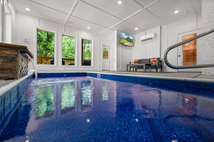 Private indoor heated pool - with seating area & TV Private indoor heated pool - with seating area & TV
