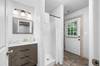 Lower level ensuite full bath with standing shower Lower level ensuite full bath with standing shower