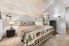 Upper level king bedroom with ensuite full bathroom Upper level king bedroom with ensuite full bathroom