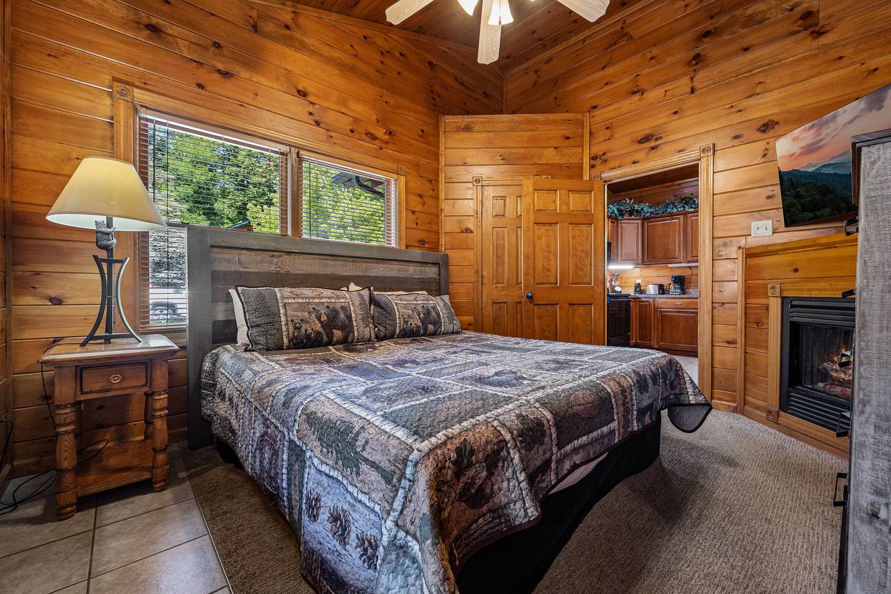 King bedroom with TV, fireplace, & heart shaped jacuzzi tub. King bedroom with TV, fireplace, & heart shaped jacuzzi tub.